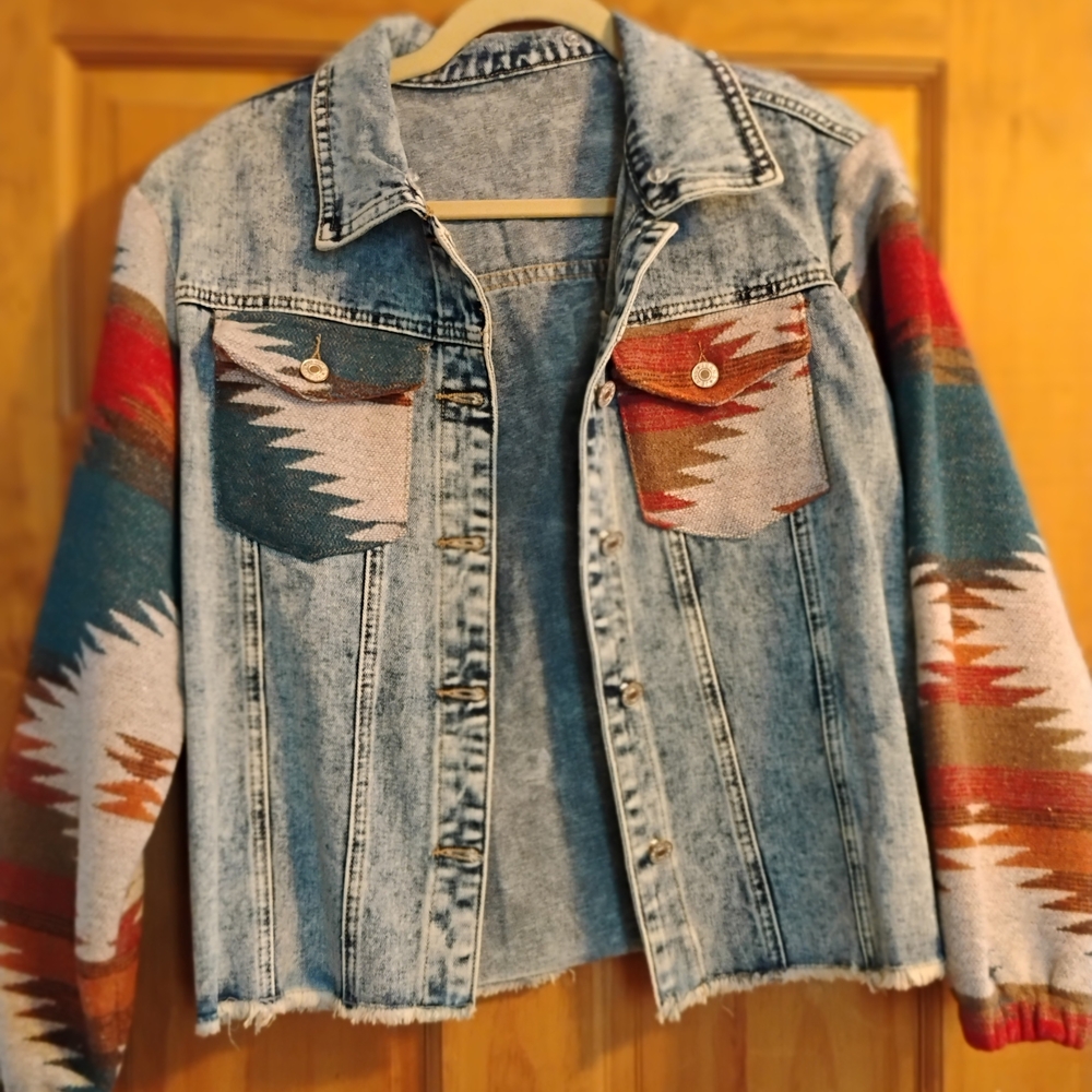 Denim Jacket with Colorful Patterned Knit Sleeves And Pockets.